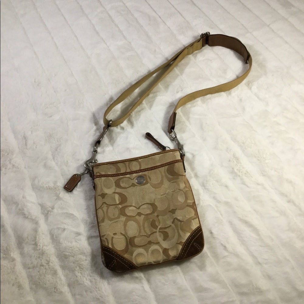 Coach crossbody used look at picture for damages.